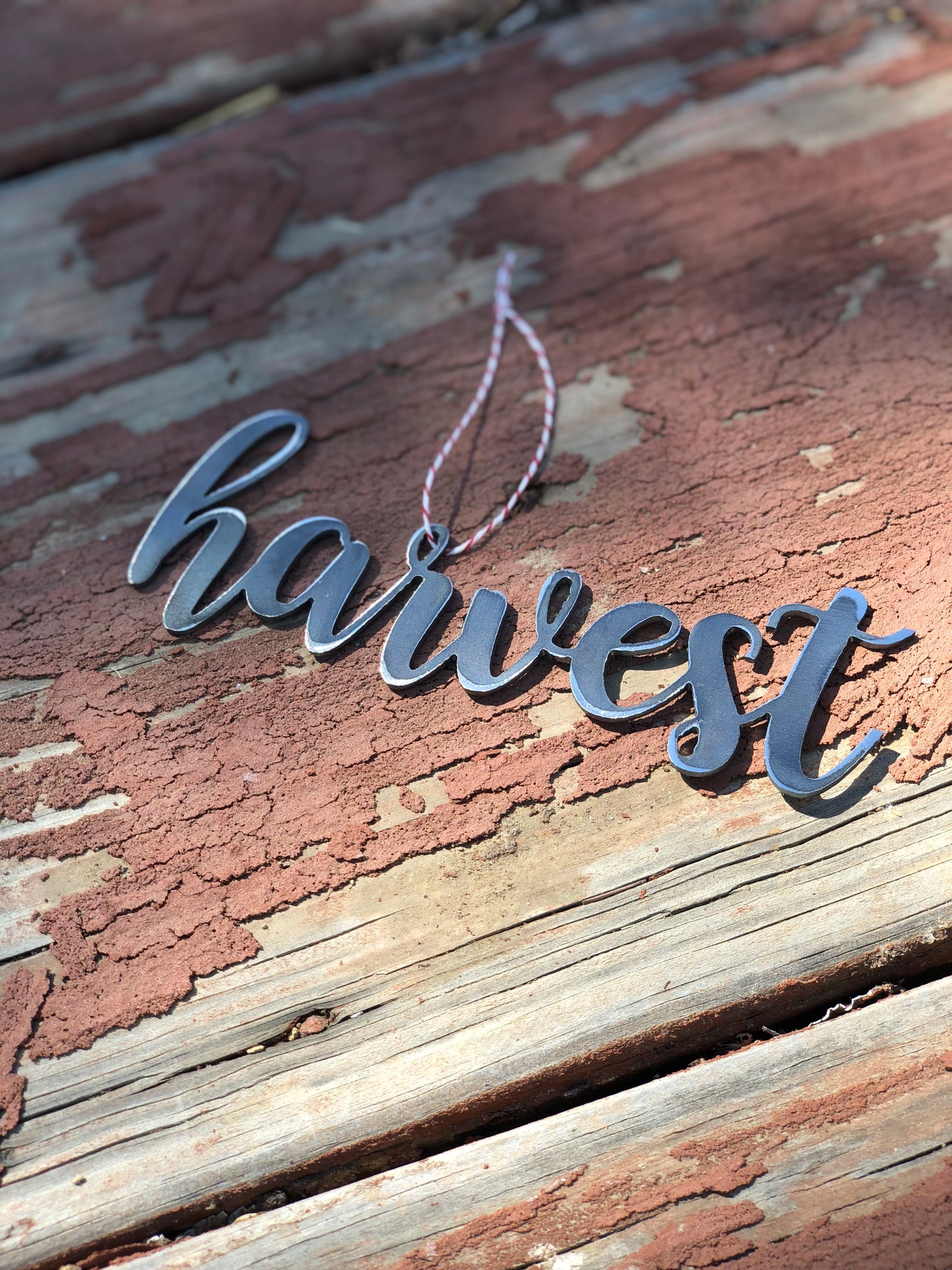 Fall themed script word metal ornament
