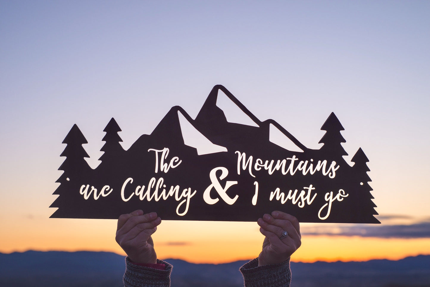 The Mountains Are Calling & I Must Go metal sign