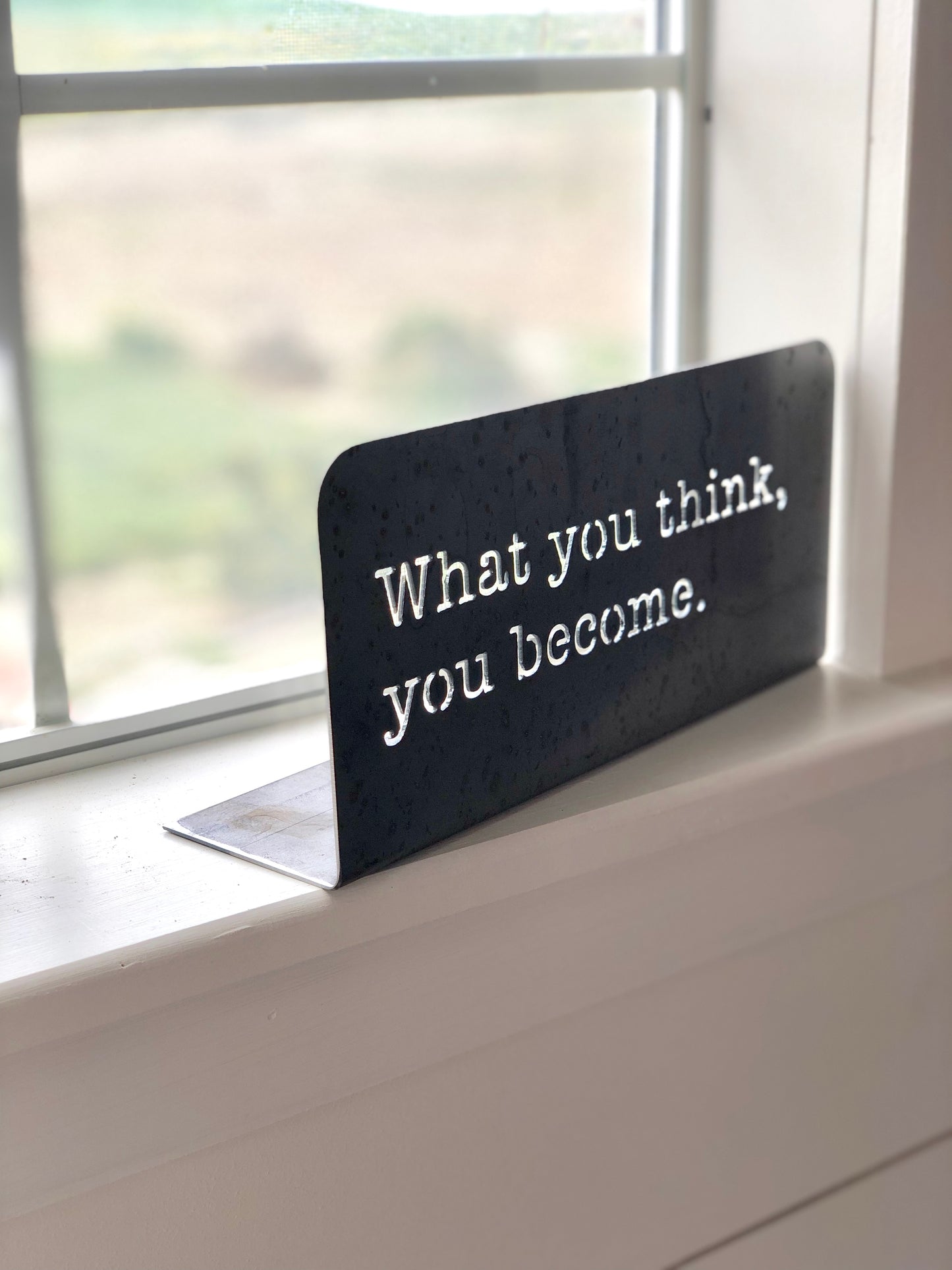 What you think, you become Standing metal mindfulness sign